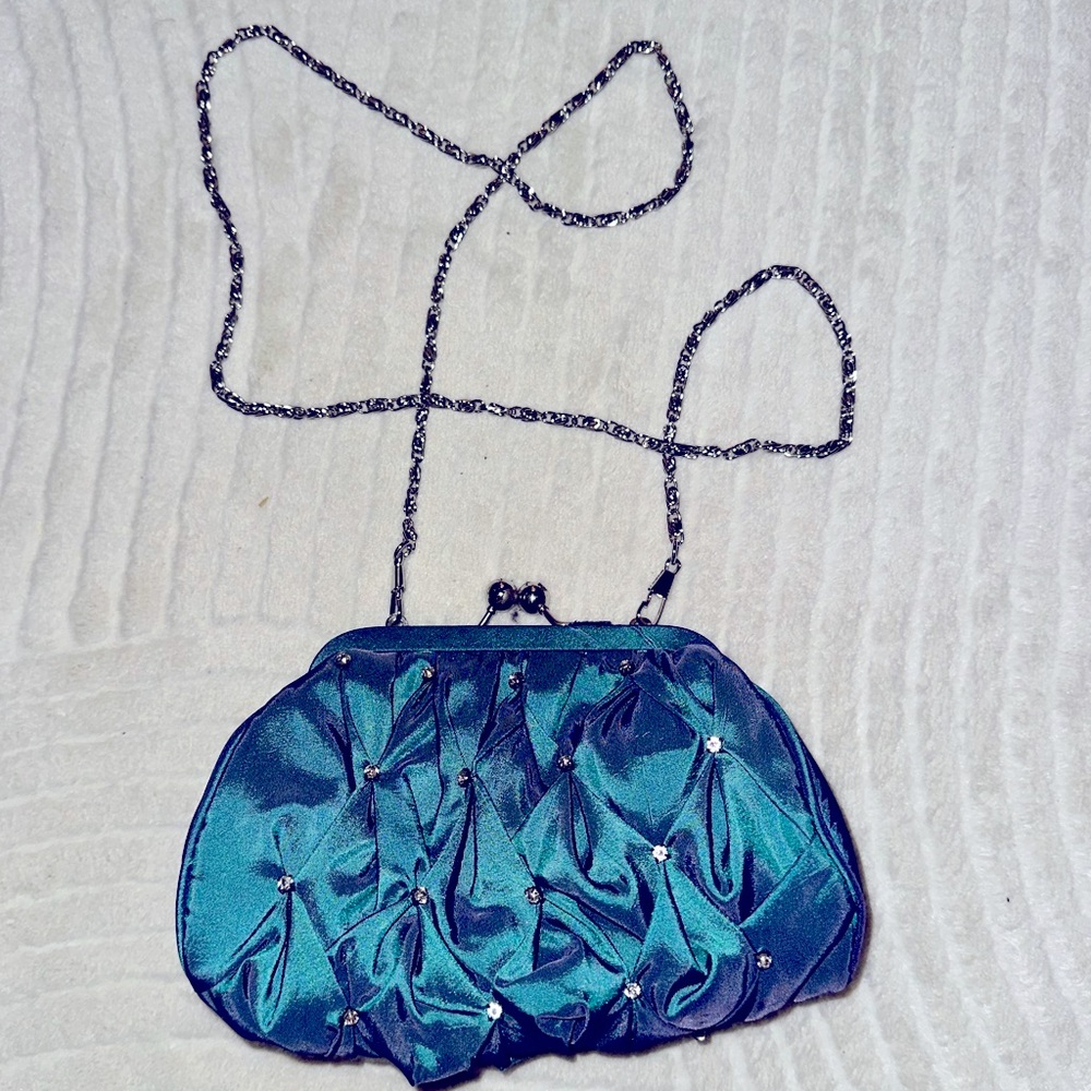 Blue/purple iridescent clutch.